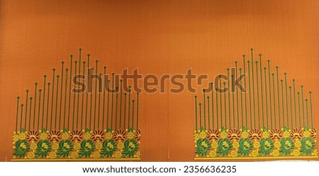Embroidery design  on mustered yellow fabric