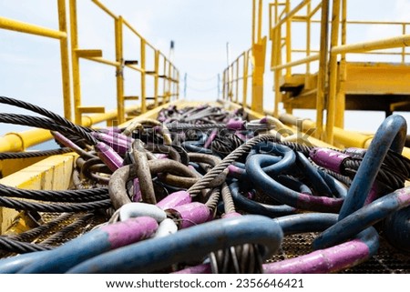 String piles are combined for use in the heavy lifting of the petroleum industry. Royalty-Free Stock Photo #2356646421