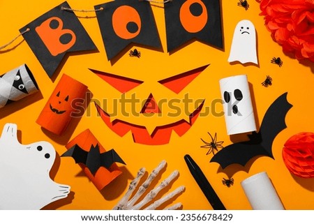 Paper Halloween mockups on yellow background, top view