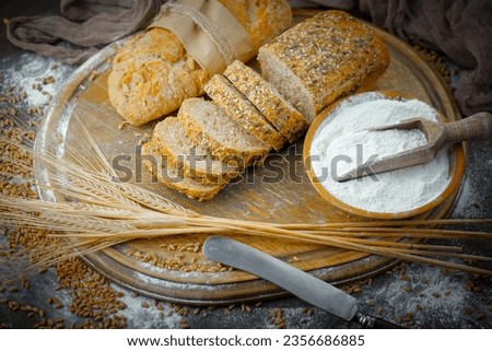 Bread and pastries on old background