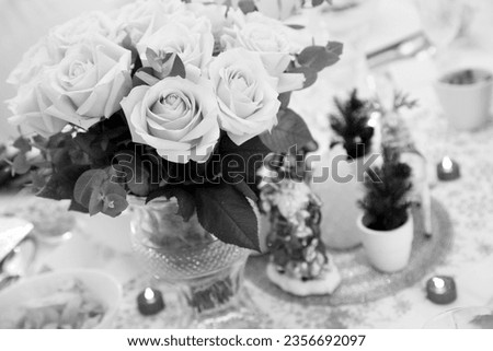 The colorful photo shows blooming flower rose with green leaves, unusual aroma bouquet flora. Flower Rose pattern consisting of pistil, stamen on green grass. Botanical floral bunch in roses flowers.