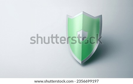 A healthcare shield adorned with a cross symbol for medical protection. Shield protection concept