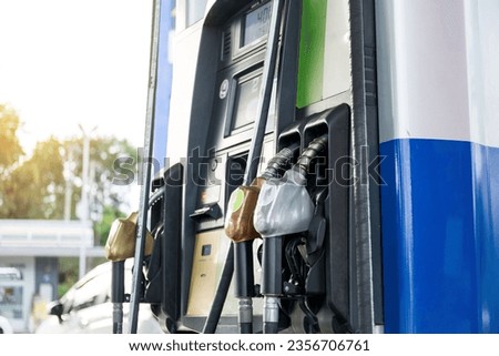 Fuel pumps gasohol, gasoline ,benzine, at a gas station ,price gasoline concept. Royalty-Free Stock Photo #2356706761