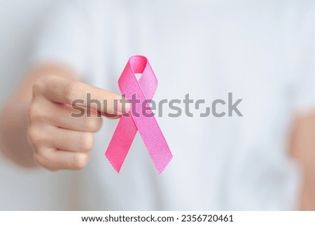 Pink October Breast Cancer Awareness month, woman with pink Ribbon in hospital for support people life and illness. National cancer survivors month, Mother and World cancer day concept Royalty-Free Stock Photo #2356720461