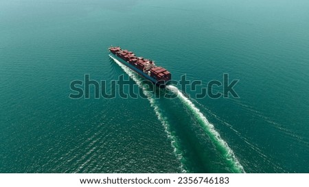 cargo container ship sailing full speed in sea to import export goods and distributing products to dealer and consumers worldwide, by container ship Transport, business logistic delivery service 
