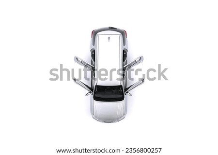 isolated simple and  metallic suv car with open doors from top view on white background that easily removable. Royalty-Free Stock Photo #2356800257
