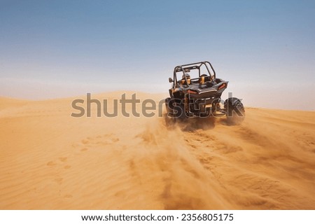 sand dune bashing offroad. utv rally buggy Royalty-Free Stock Photo #2356805175