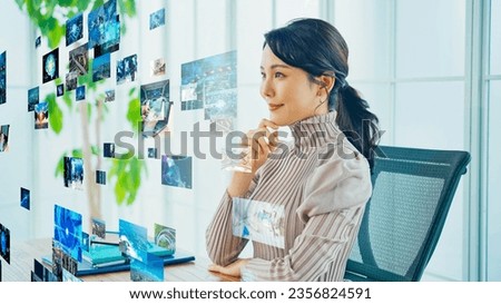 Woman watching holographic movies. Digital contents.
