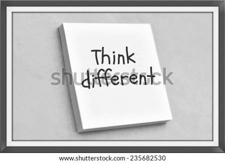 Vintage style text think different on the short note texture background