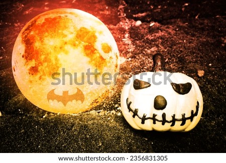 Halloween background idea, Halloween pumkin with bright moon on dark background, vintage filter
