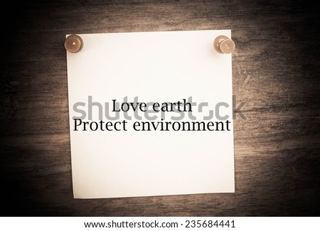 Text love earth protect environment on note paper