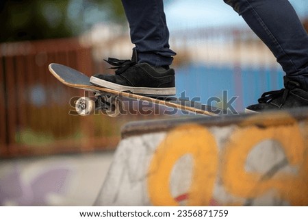 Skateboarder skating outdoors on a sunny morning