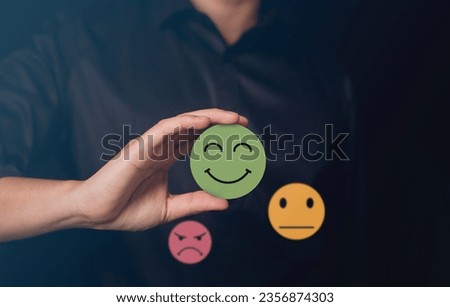 Happy Client giving Positive Review. 
Customer Experience Concept the best feedback for ranking Products and Services. Client Satisfaction choose smiley icon on marketing Strategy. 