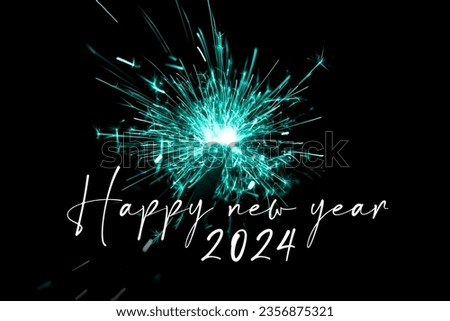 Happy new year 2024 turquoise sparkler new years eve countdown. Luxury entertainment celebration turn of the year party time. Premium nightlife visual with glowing light sparks on dark background