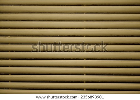 This is a metal louvered close-up
