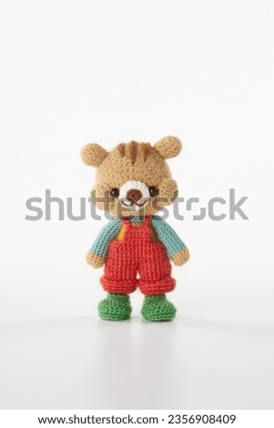Handmade knitted toy. cute and small animal Amigurumi doll. medical