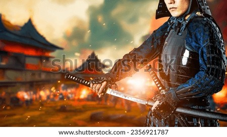 A samurai standing on the battlefield. Sengoku period. Wide image for banners, advertisements. Royalty-Free Stock Photo #2356921787