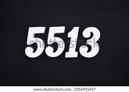 Black for the background. The number 5513 is made of white painted wood.