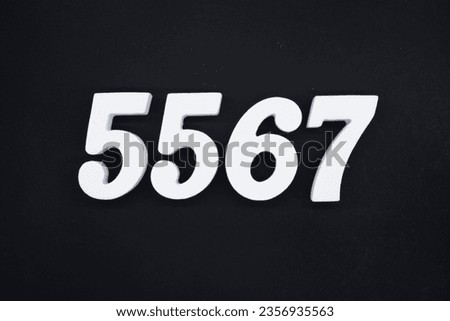 Black for the background. The number 5567 is made of white painted wood.