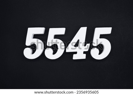 Black for the background. The number 5545 is made of white painted wood.