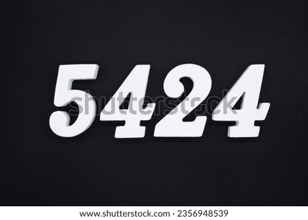 Black for the background. The number 5424 is made of white painted wood.