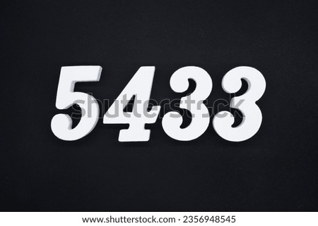 Black for the background. The number 5433 is made of white painted wood.