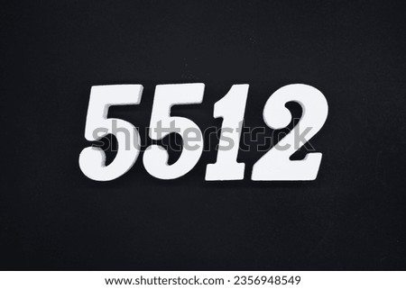 Black for the background. The number 5512 is made of white painted wood.