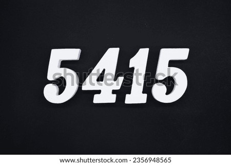 Black for the background. The number 5415 is made of white painted wood.
