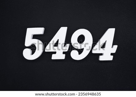 Black for the background. The number 5494 is made of white painted wood.