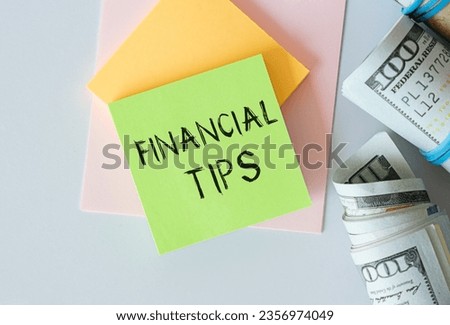 FINANCIAL TIPS text on white card on the chart background