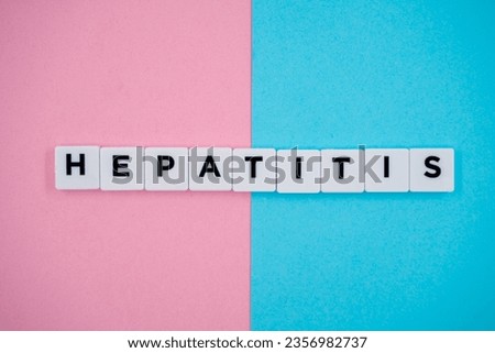 Hepatitis letter isolated on pink and blue background.