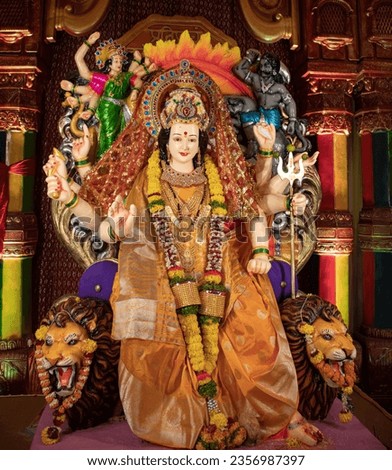 Idol statue of Goddess Maa Durga, Happy Navratri and Dussehra Royalty-Free Stock Photo #2356987397