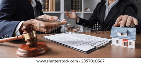 Real estate businessman consults a lawyer against the law relating to houses, land and real estate