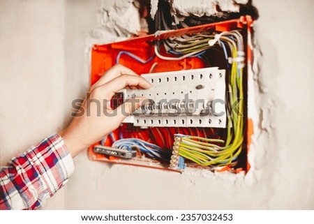 automatic switch - protection of electrical network against overvoltage and short circuit, protection of wiring against ignition and fire Royalty-Free Stock Photo #2357032453