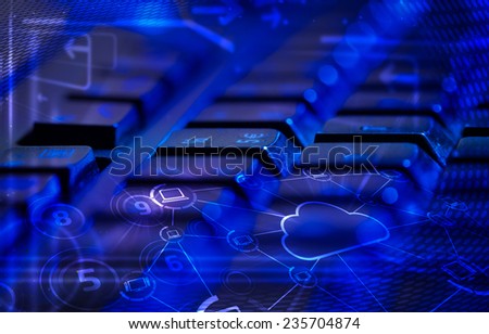 Computer keyboard with glowing cloud computing and multimedia icons