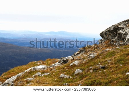 At the top of the mountain in northern Sweden on a late summer day. Royalty-Free Stock Photo #2357083085