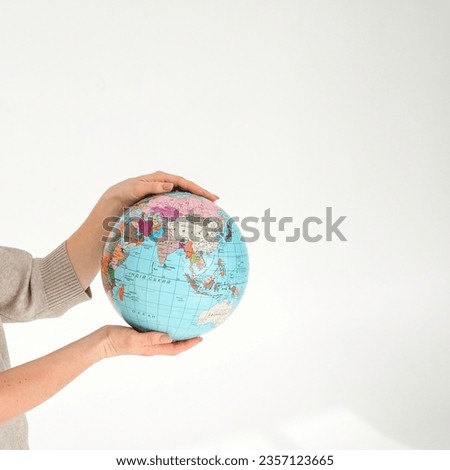 Hands holding a globe. Planet earth. Ecology. High quality photo