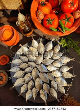 White pomfret fish images photos pictures.Pomfret fish Curry pictures images. Healthy lunch dinner with fish images.Special pomfret fish dish recipe images photos pictures.
