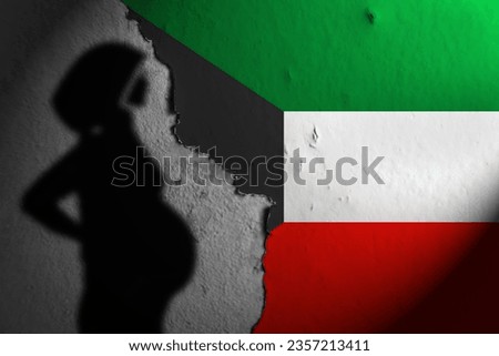 shadow of a pregnant woman in kuwait. Population in kuwait.