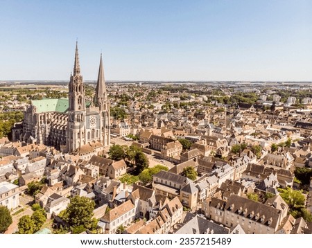 Panorama. Old part of Chartres, France with the main cathedral (Cathédrale Notre-Dame de Chartres). Drone photography. Royalty-Free Stock Photo #2357215489