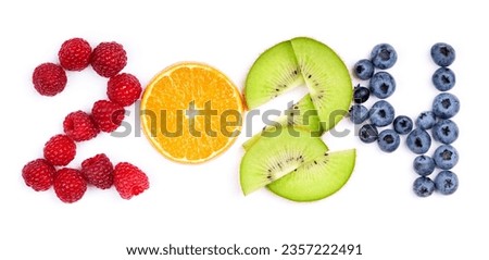 Fruits. New year 2024 made of fruits on the white background. Healthy food Royalty-Free Stock Photo #2357222491