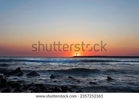 Sunset and sea view. Photo taken with the long exposure technique. Turkey Kusadası Beach.  