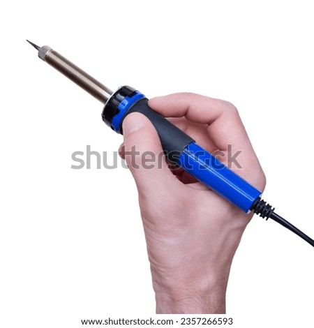 A man is holding a soldering iron in his hand. Isolated on a white background.