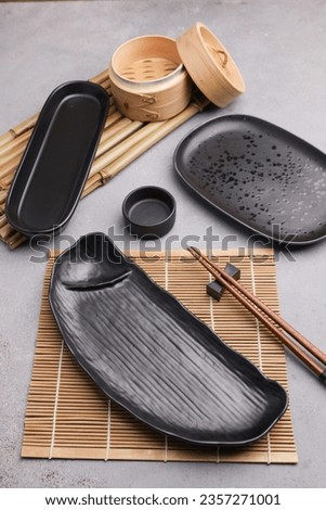 Group of black plate on the table, studio set for food photography