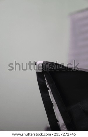 Strap on side of softbox with white color 
