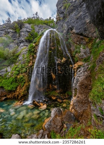 Natural landscape at Grunas waterfall in Theth national park, Albania. Albanian alps
