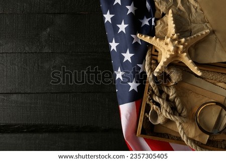 Columbus Day. Starfish with old letters and American flag
