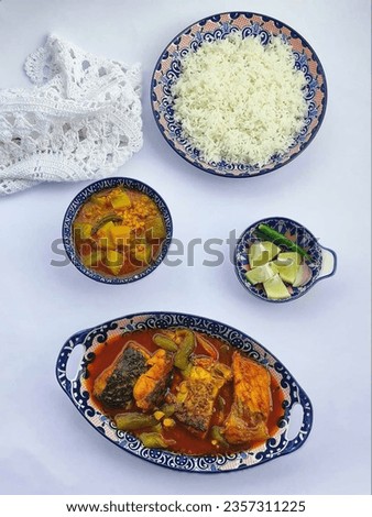 Rice fish curry pictures images photos.Special fish dish lunch dinner pictures images.