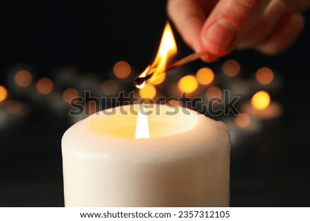 Concept of sadness and sorrow - sorrow candles Royalty-Free Stock Photo #2357312105