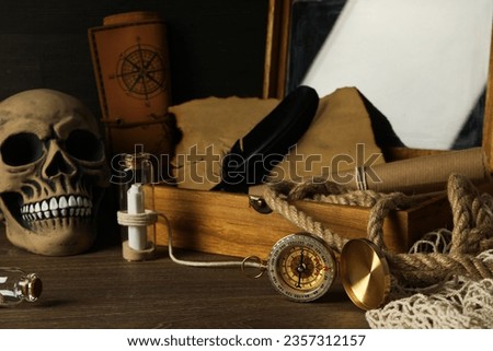 Columbus Day. Skull with a compass on the table